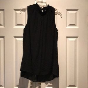 Sleeveless mock neck shirt